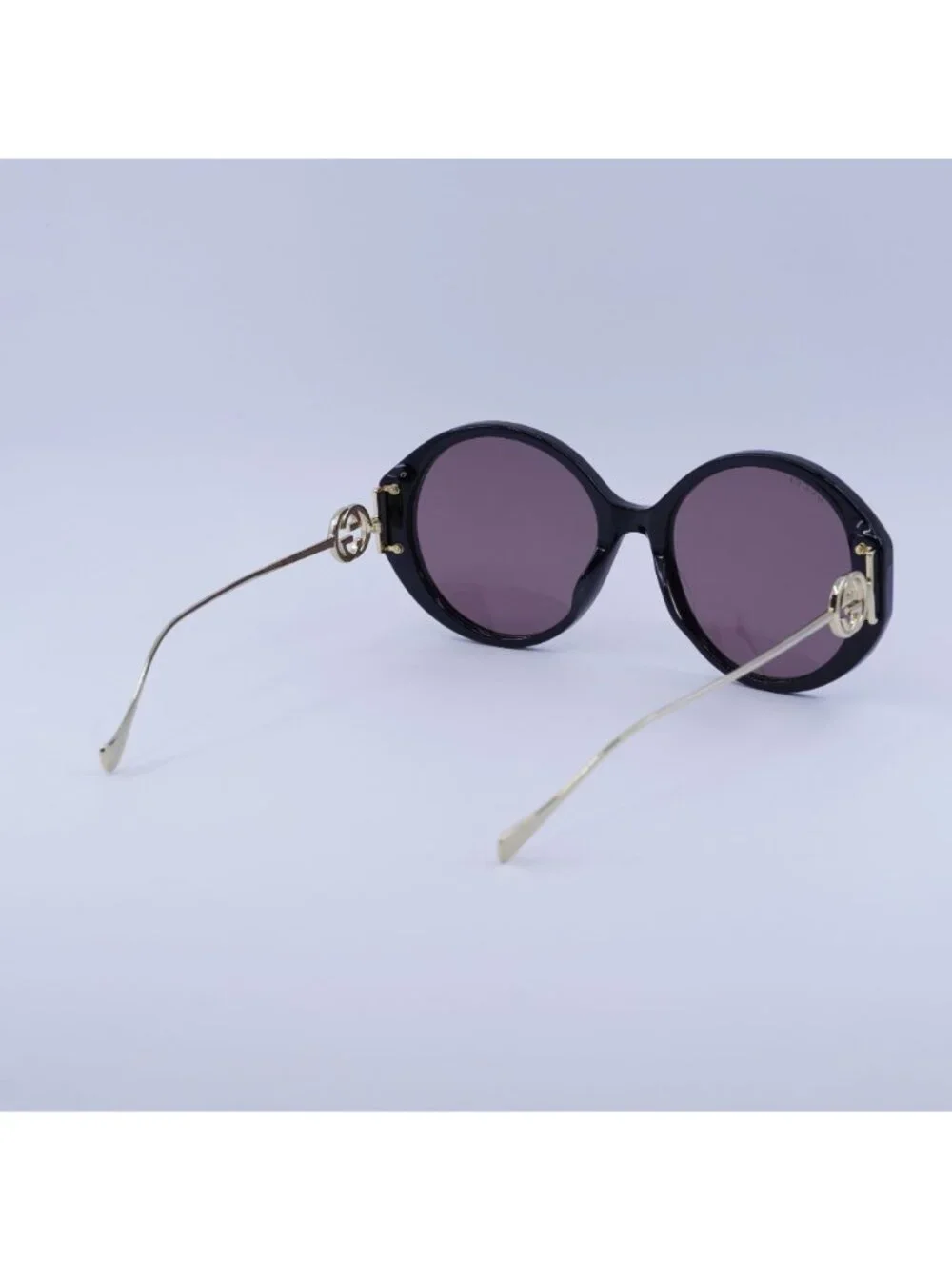 Gucci GG1202S 001 Sunglasses Black Round Frame, Brown Lenses